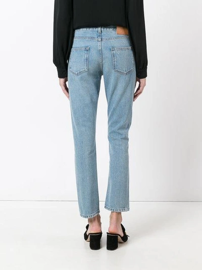 Shop Gucci Embroidered Flower Jeans In Blue