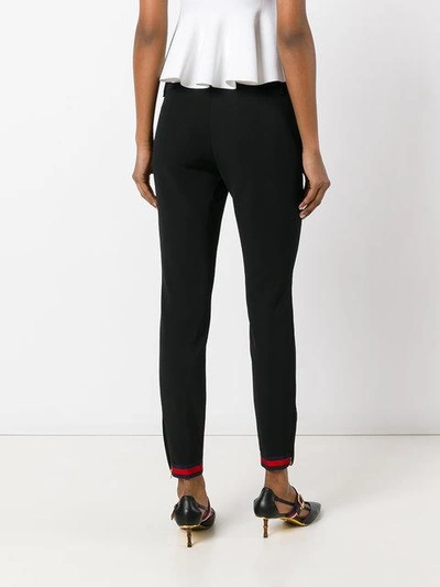 Shop Gucci Web Zipped Cuff Trousers In Black