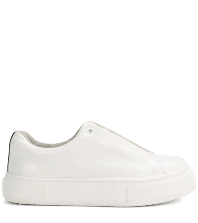 Shop Eytys Doja Leather Sneakers In White