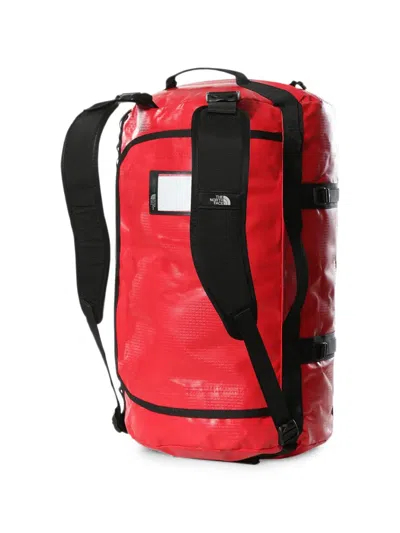 The North Face Small Base Camp Duffel Backpack In Red
