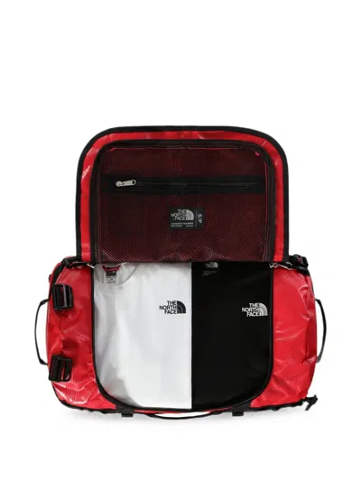 The North Face Small Base Camp Duffel Backpack In Red