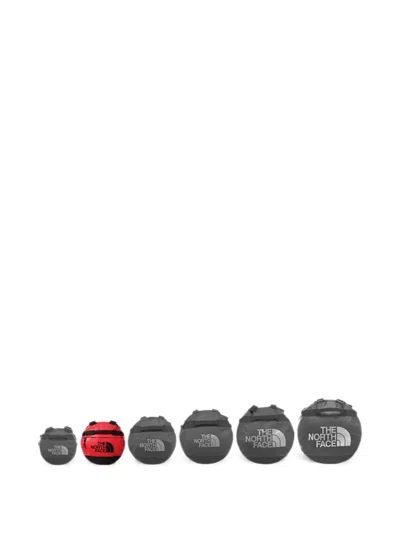 The North Face Small Base Camp Duffel Backpack In Red