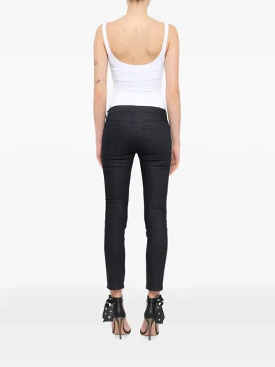 Alexander Mcqueen Belt-loop Bottuned Jeans In Black