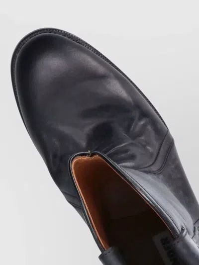 Jil Sander Aged-effect Leather Boots In Black