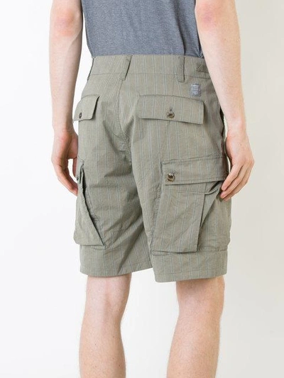 Shop Undercover Faint Striped Cargo Shorts In Green