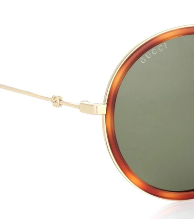 Shop Gucci Round Sunglasses In Green