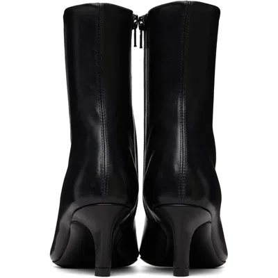 Jude Black Cave Ankle Boots In Black