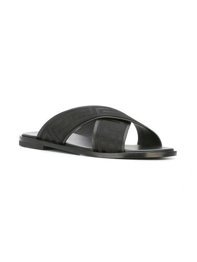 Shop Versace Greek Key Crossover Sandals - Black