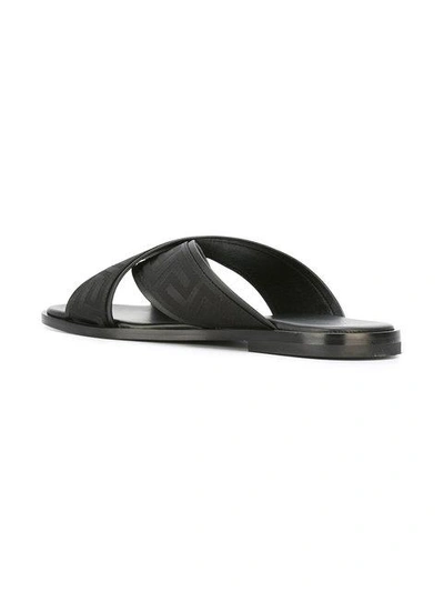 Shop Versace Greek Key Crossover Sandals - Black