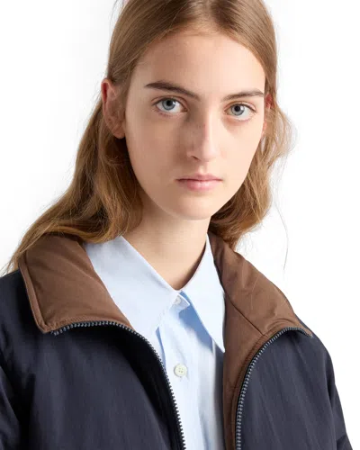 Prada Reversible Re-nylon Down Jacket In Blue