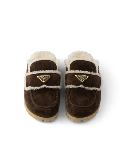 Prada Shearling-trim Logo-plaque Suede Mules In Brown