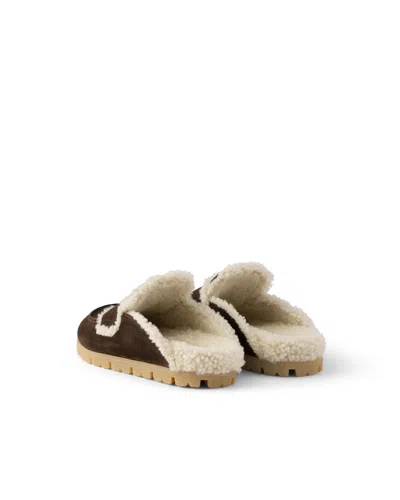 Prada Shearling-trim Logo-plaque Suede Mules In Brown