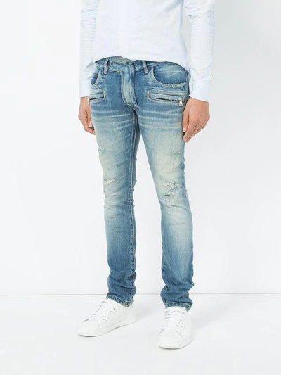 Shop Balmain Ripped Skinny Jeans In 155 Bleu