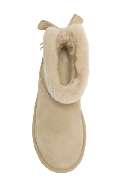 Ugg ® Mini Bailey Bow Faux Shearling Boot In Mustard Seed