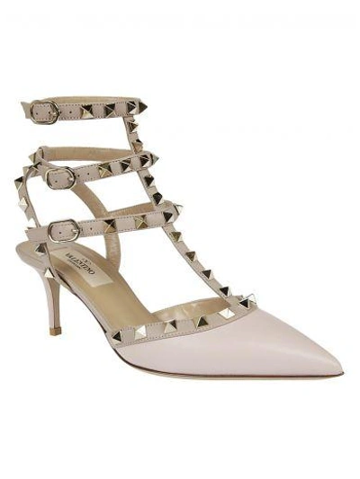 Shop Valentino Rockstud Pumps In Rosa