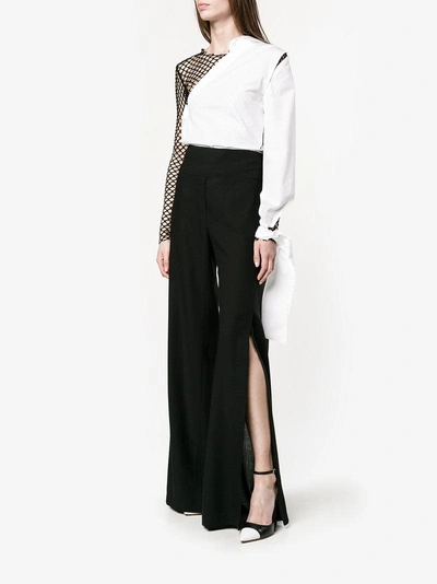 Shop Ann Demeulemeester Slit Wide-leg Trousers In Black