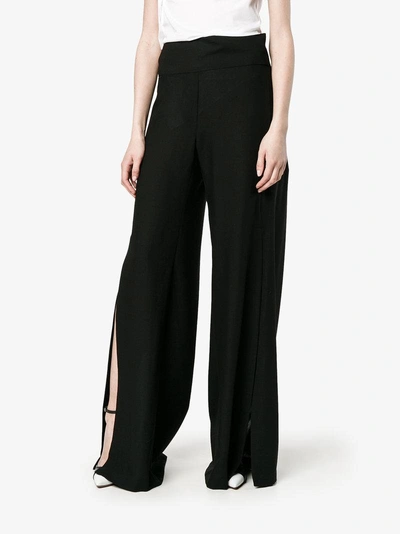 Shop Ann Demeulemeester Slit Wide-leg Trousers In Black