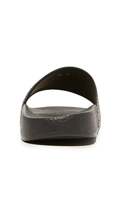 Shop Ferragamo Groove Slides In Nero