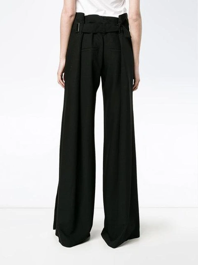 Shop Ann Demeulemeester Slit Wide-leg Trousers In Black