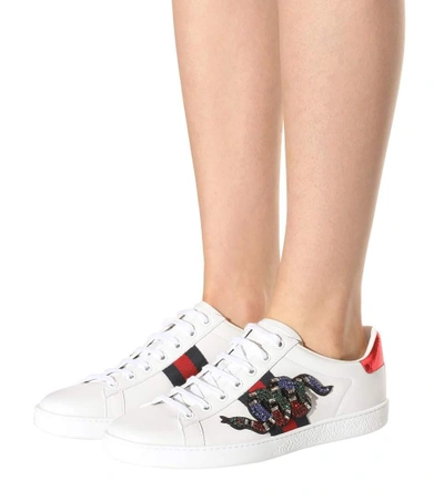 Shop Gucci Ace Embellished Sneakers In Liaeco