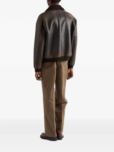 Prada Collared Long-sleeved Leather Jacket In Brown