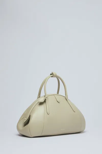 Alaïa Small Top Handle Purse In Beige