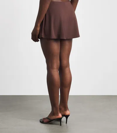 Skims Smooth Layers Mini Skort In Brown