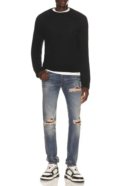 Amiri Distressed Patchwork Jeans In Blue