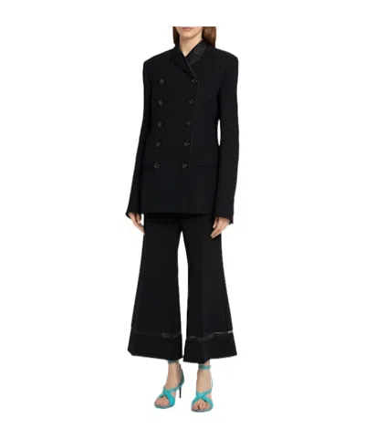 Khaite Wallace Flared Poly Pants In Red