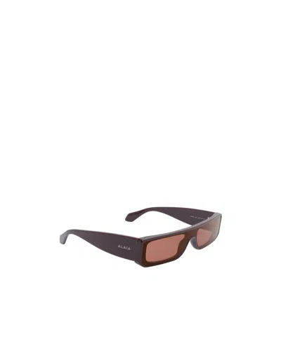 Alaïa Rectangle-frame Sunglasses In Pink
