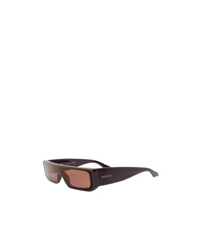 Alaïa Rectangle-frame Sunglasses In Pink