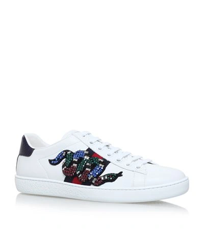 Shop Gucci New Ace Embellished Snake Sneakers