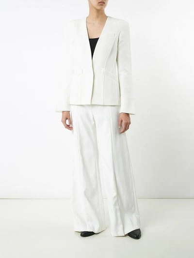 Shop Mugler Flared Trousers - White