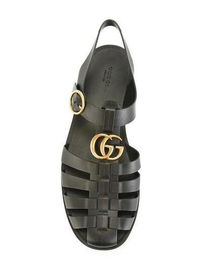 Gucci Black Glossy Rubber Sandals | ModeSens