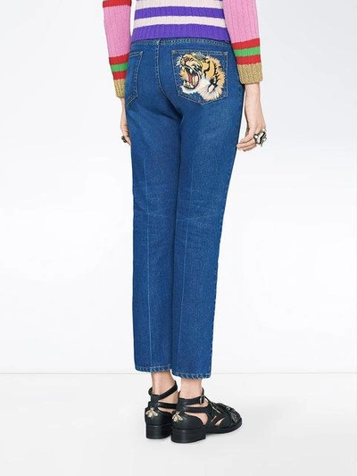 Shop Gucci Embroidered Jeans In Blue