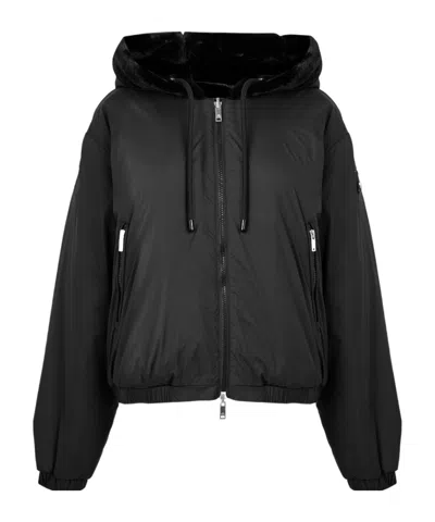 Moose Knuckles Cropped Black Faux Fur Jacket With Plush Hood And Zippered Pockets In Black