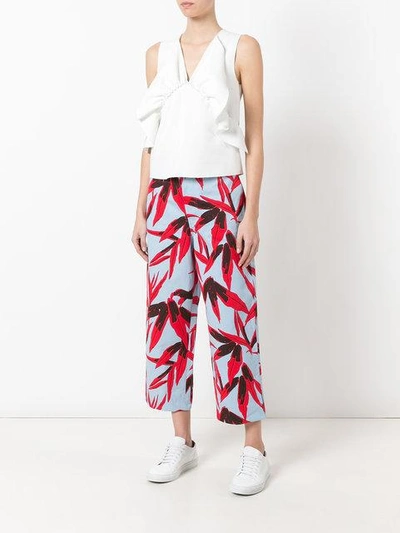 Shop Marni Drill Swash Print Cropped Trousers In Blue