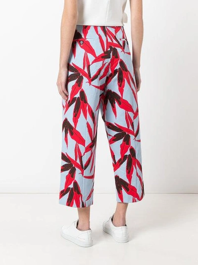 Shop Marni Drill Swash Print Cropped Trousers In Blue