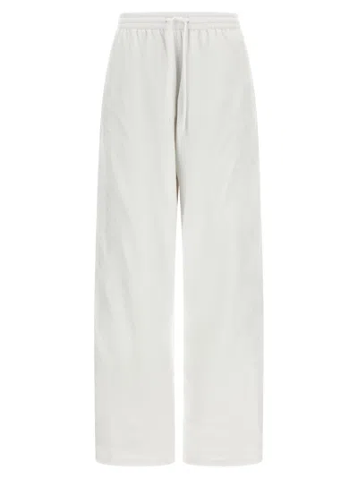 Balenciaga Cursive-embroidered Polyamide Joggers In White