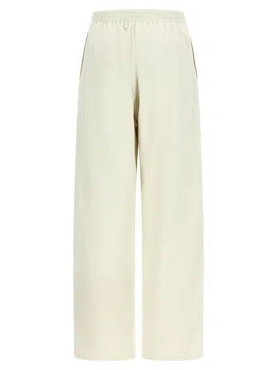 Balenciaga Cursive-embroidered Polyamide Joggers In White