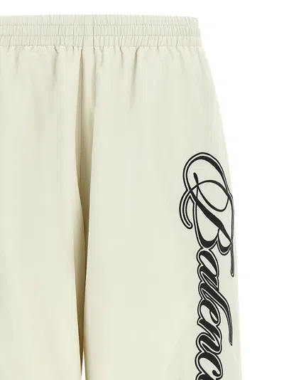 Balenciaga Cursive-embroidered Polyamide Joggers In White