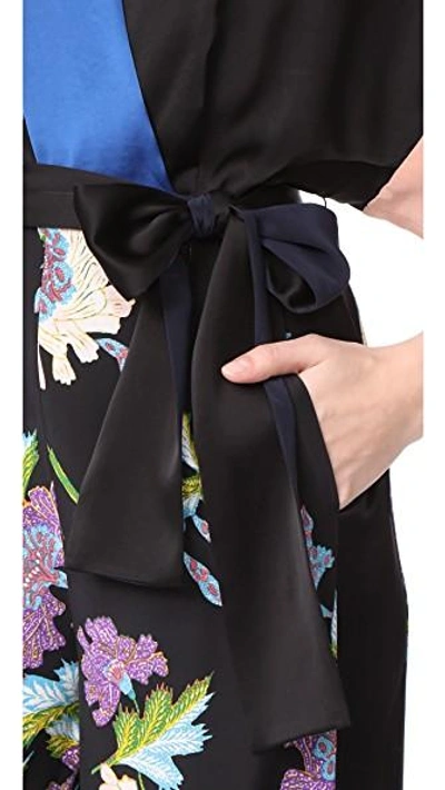Shop Diane Von Furstenberg S/s Faux Wrap Jumpsuit In Crz On Blk/french Bl/dust R/