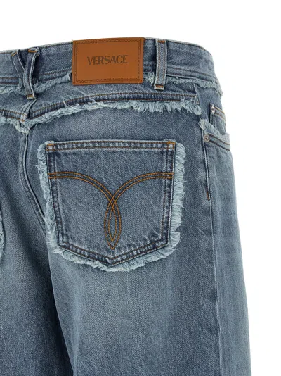 Versace Stonewashed Denim Jeans In Blue