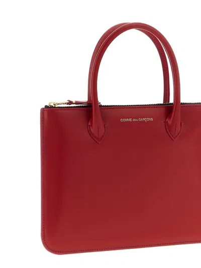 Comme Des Garçons Leather Top Handle Bag In Red