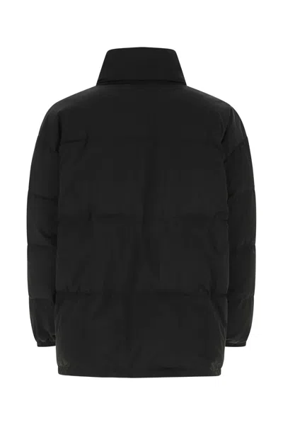 Moschino Quilted High Collar Jacket With Elasticated Cuffs In Black