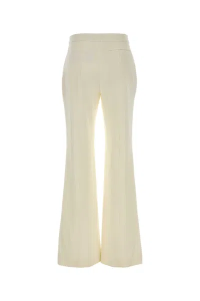 Givenchy Flared Wool Trousers Featuring Belt Loops In Neutral