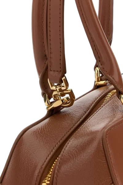 Givenchy Structured Calf Leather Top Handle Bag In Brown