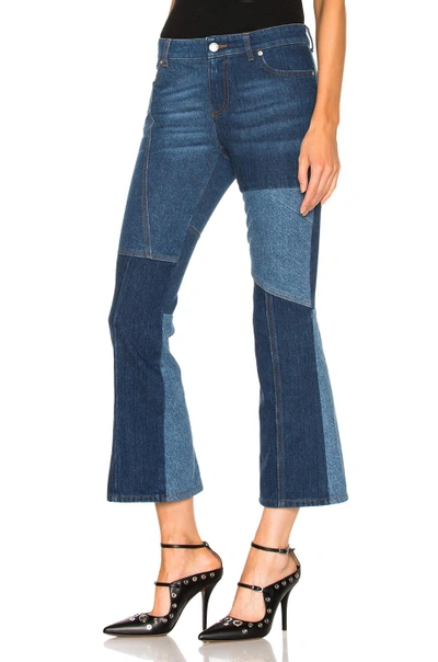 Shop Alexander Mcqueen Patchwork Cropped Flare Jeans In Blue