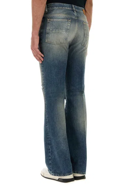 Amiri Slashed Boot Cut Jean In Blue