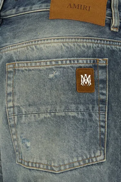Amiri Slashed Boot Cut Jean In Blue